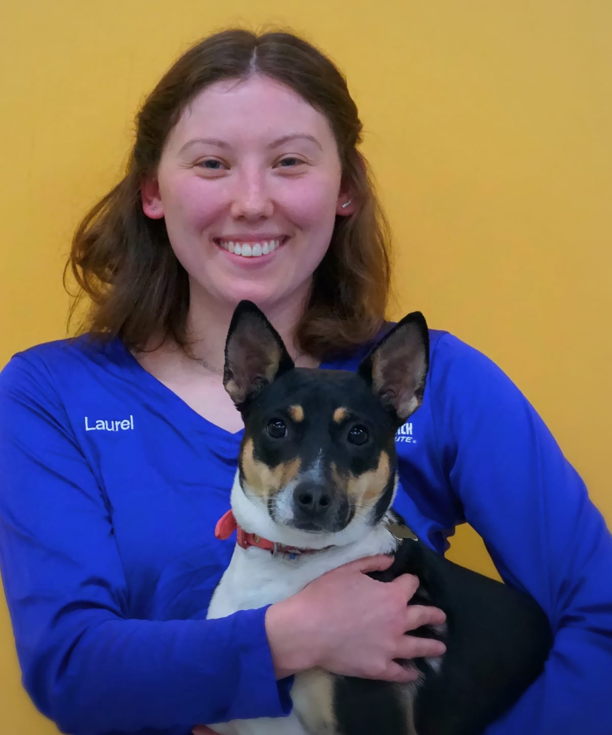 Leader of the Pack dog trainer, Laurel, with short haired dog