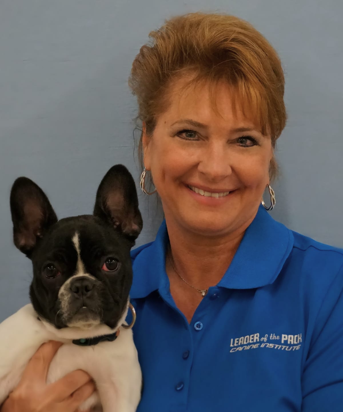 Lisa McDonald - Lead Dog Trainer at Leader of the Pack Canine Institute with black & white french bulldog
